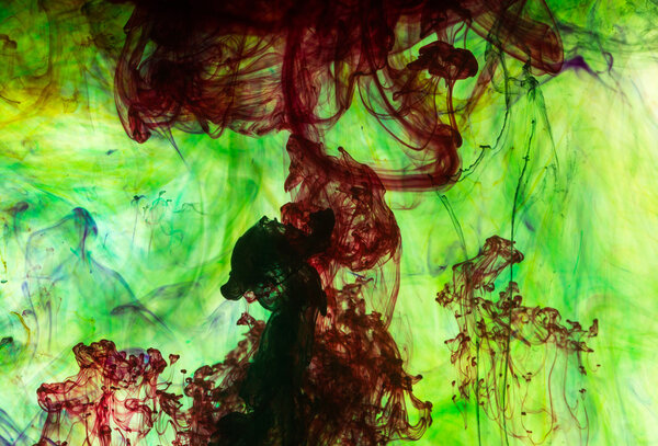 Acrylic colors and ink in water. Abstract background.