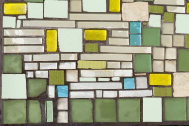 Duvar, soyut cam arka plan üzerinde renkli mozaik.