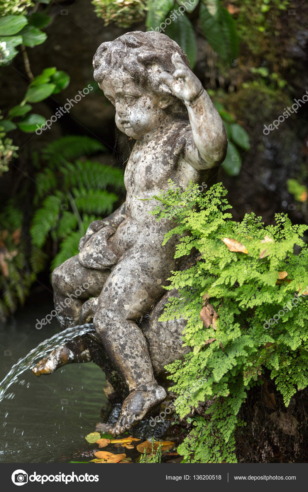 Statue Of Child In Botanical Garden Monte Of Funchal Madeira