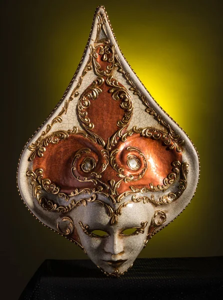 Beuaty Venetian mask isolated on black and yellow background — Stock Photo, Image