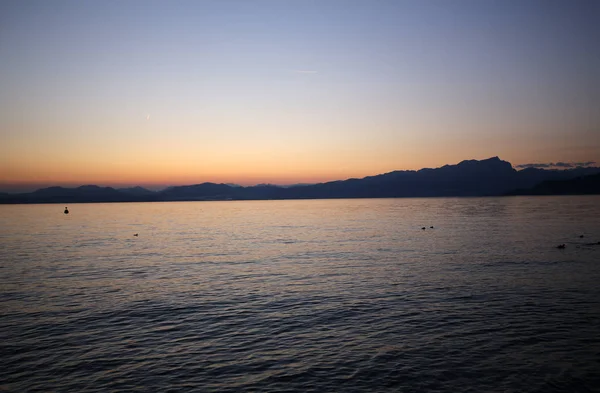 Beautiful sunset at Garda lake . — Stock Photo, Image