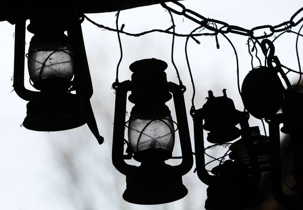 Many lit storm lanterns or hurricane lamps. — Stock Photo, Image