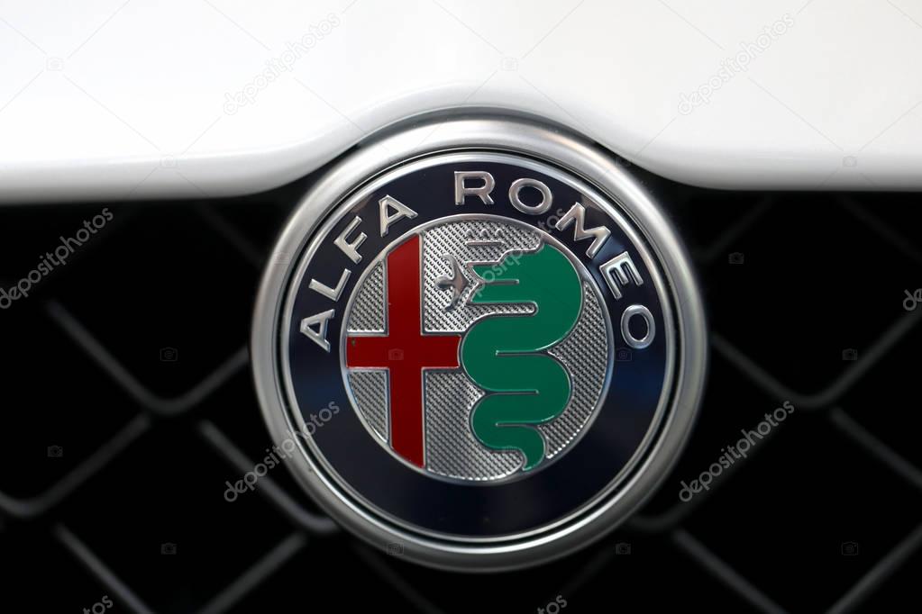 CRACOW, POLAND - MAY 20, 2017: Alfa Romeo metallic logo closeup on Alfa Romeo car displayed at 3rd edition of MOTO SHOW in Cracow Poland. Exhibitors present  most interesting aspects of the automotive industry