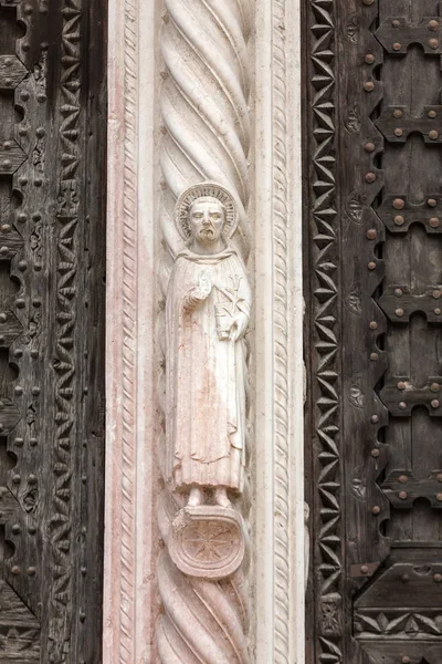Relief on Facade of Sant\'Anastasia Church in Verona, Italy.