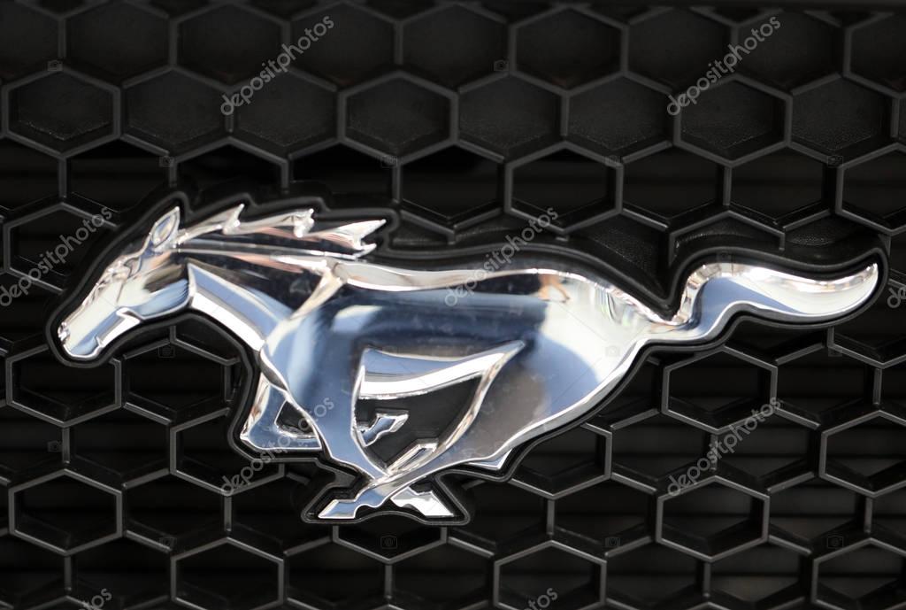 CRACOW, POLAND - MAY 20, 2017: Ford Mustang metallic logo closeup on Ford Mustang  car displayed at  MOTO SHOW in Cracow Poland. Exhibitors present  most interesting aspects of the automotive industry