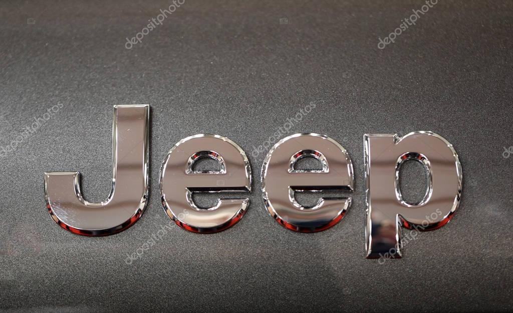 CRACOW, POLAND - MAY 20, 2017: Jeep metallic logo closeup on Jeep car displayed at  MOTO SHOW in Cracow Poland. Exhibitors present  most interesting aspects of the automotive industry