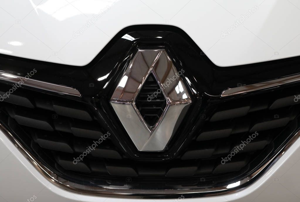 CRACOW, POLAND - MAY 20, 2017: Renault metallic logo closeup on Renault car displayed at  MOTO SHOW in Cracow Poland. Exhibitors present  most interesting aspects of the automotive industry