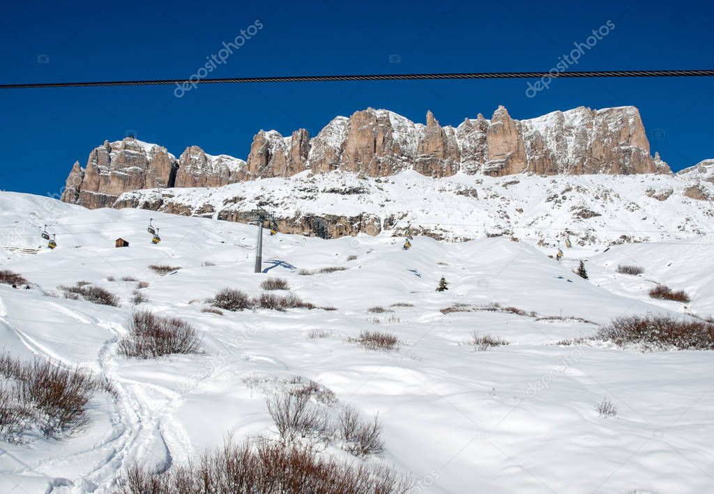 Skiing area in the Dolomites Alps. Overlooking the Sella group  in Val Gardena.