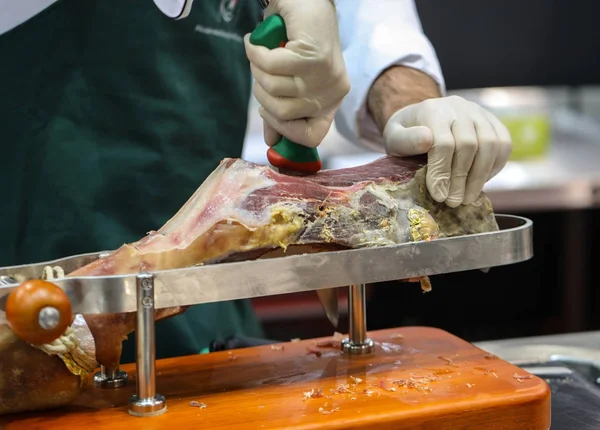 Cutting Slices Cured Iberian Ham — Stock Photo, Image