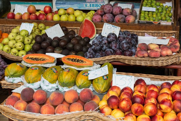 FUNCHAL, MADEIRA, PORTUGAL - SEPTEMBER 12, 2016: Fresh exotic fruits in Mercado Dos Lavradores. Funchal, Madeira, Portugal