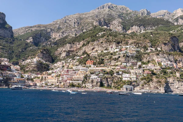 Panorama of Positano with houses climbing up the hill, Campania, Italy