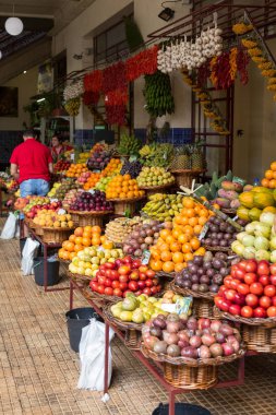 FUNCHAL, MADEIRA, PORTUGAL - SEPTEMBER 12, 2016: Fresh exotic fruits in Mercado Dos Lavradores. Funchal, Madeira, Portugal