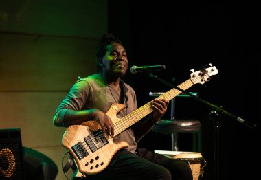 Cracow, Poland - Oct 21, 2019: Alfredo Rodriguez and Richard Bona live on stage in Manggha Museum of Japanese Art and Technolog clipart