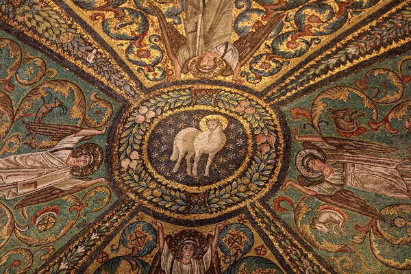 Ravenna, Italy - Sept 11, 2019: Interior of Basilica of San Vitale, which has important examples of early Christian Byzantine art and architecture.Ceiling mosaic of the presbitery with the "agnus dei" in the middle. San Vitale Ravenna