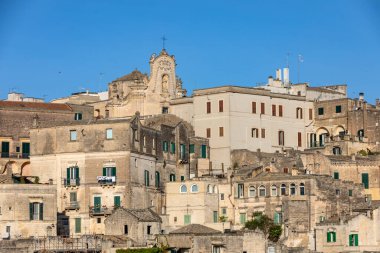 Sassi di Matera 'nın manzarası. Matera şehrinin tarihi bir bölgesidir. Eski mağara evleri ile ünlüdür. Basilicata. İtalya