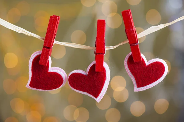 Three hearts hanging — Stock Photo, Image