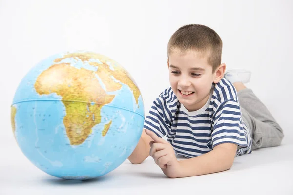 Happy kid showing on Australia — Stock Photo, Image