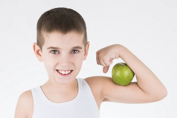 Boy with green apple — Stock Photo, Image