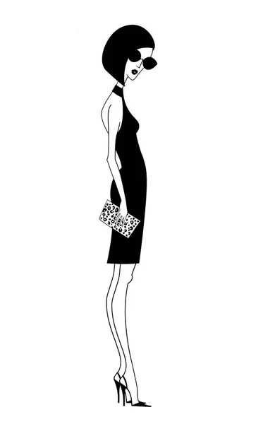 Chique jongedame in een zwarte jurk en hoge hakken — Stockfoto