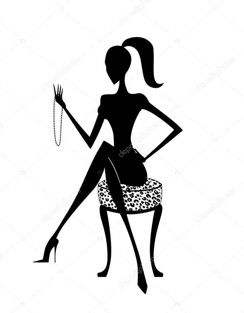 Fashion Silhouette of a Stylish Woman Seated and Looking at a Pe