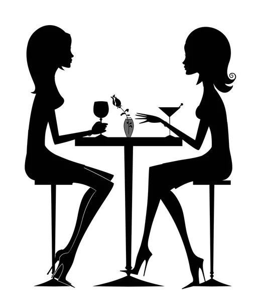 Silhouette of two friends having cocktails — Stock Photo, Image