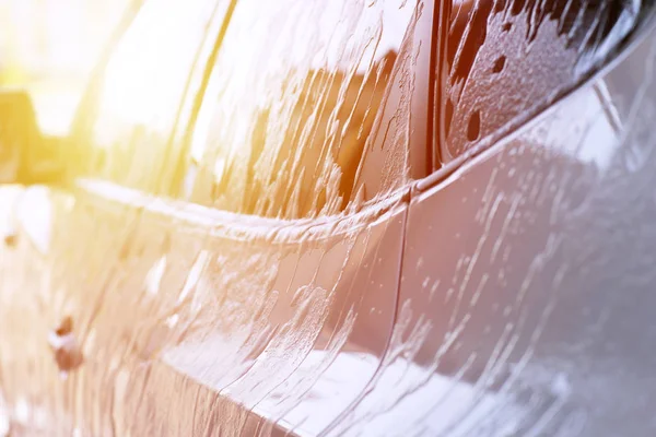 Carwash, Car in foam — Stock Photo, Image
