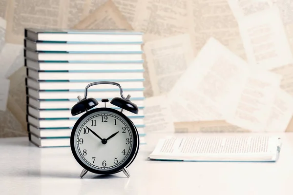 Eduction Concept Alarm Clock Book Reading Table Toned — Stock Photo, Image