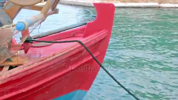 Close up of red fishing boat in Aegean sea, Nea Anchialos, Greece — Stock Footage Close up of red fishing boat in Aegean sea, Nea Anchialos, Greece Stock Footage