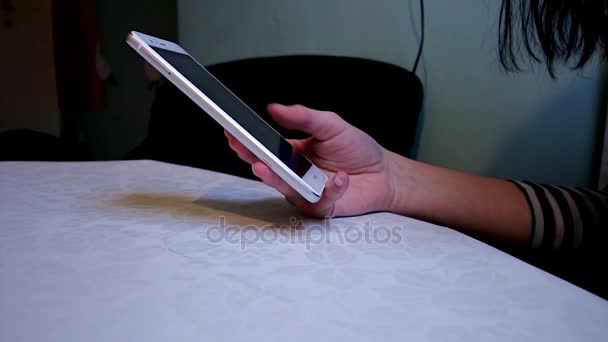 Girl Using Touch Screen Pad Technology One Finger Sitting Dark — Stock Video