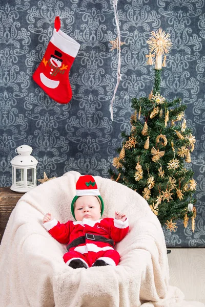 Beautiful little baby celebrates Christmas — Stock Photo, Image