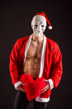 seksi Noel Baba giyen maskesi