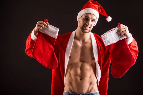 Hübsche sexy Weihnachtsmann claus — Stockfoto