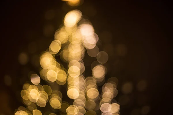 Bokeh de árvore de luz de Natal grande — Fotografia de Stock