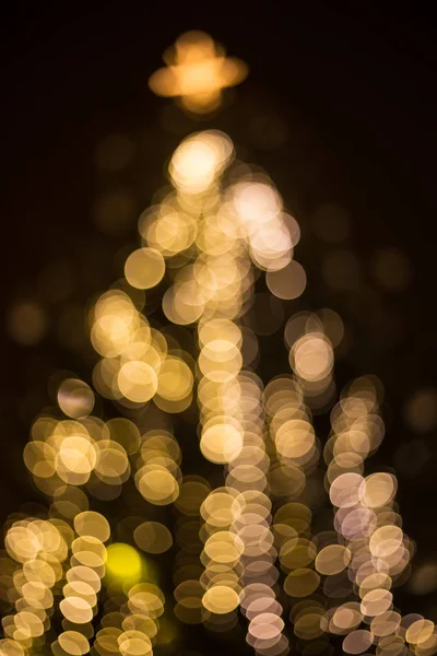 Bokeh de árvore de luz de Natal grande — Fotografia de Stock