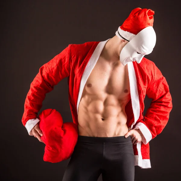 Sexy santa claus dragen masker — Stockfoto