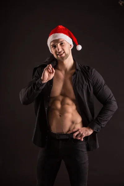 Hübsche sexy Weihnachtsmann claus — Stockfoto