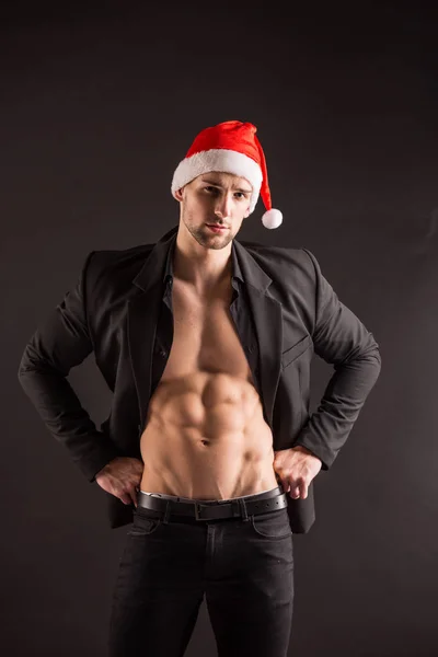 Hübsche sexy Weihnachtsmann claus — Stockfoto