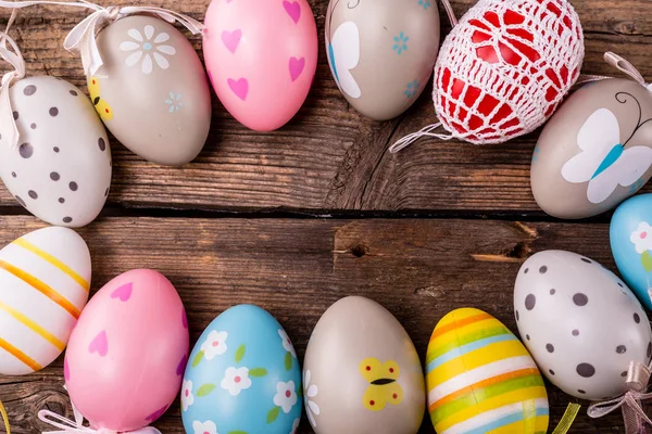 Easter eggs on rustic wooden background — Stock Photo, Image