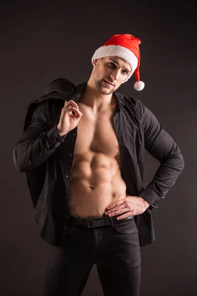 Hübsche sexy Weihnachtsmann claus — Stockfoto