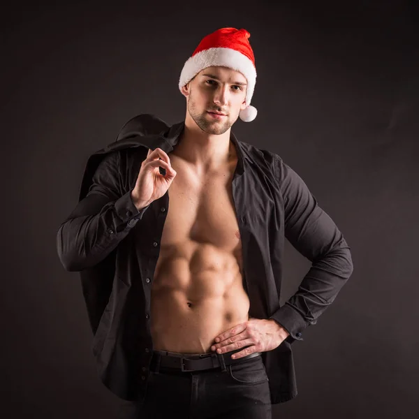 Hübsche sexy Weihnachtsmann claus — Stockfoto