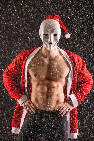 Sexy santa claus dragen masker — Stockfoto