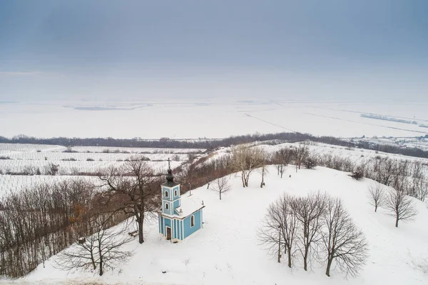 Small blue chapel with snow — Stock Photo, Image