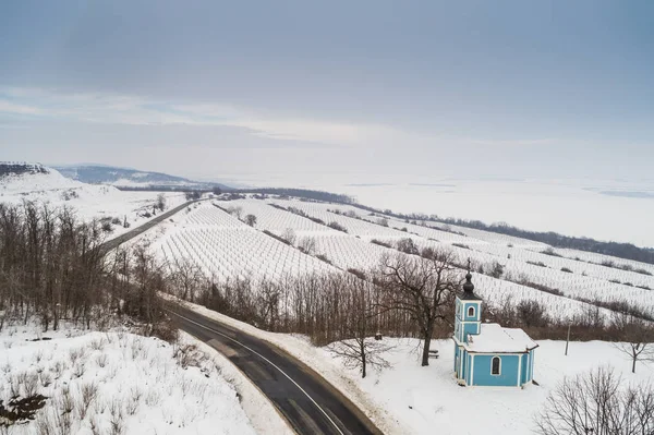 Small blue chapel with snow — Stock Photo, Image