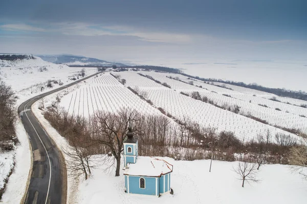 Small blue chapel with snow — Stock Photo, Image