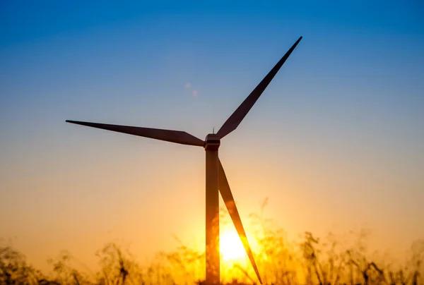 Wind turbine at sunset, Crete, Greece — Stock Photo, Image