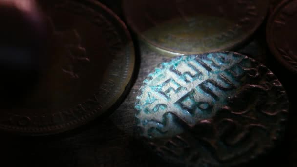 Close up of very old coins — Stock Video