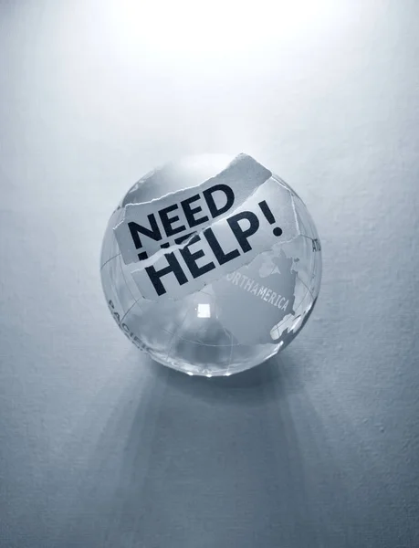 Close Need Ayuda Etiqueta Con Globe — Foto de Stock