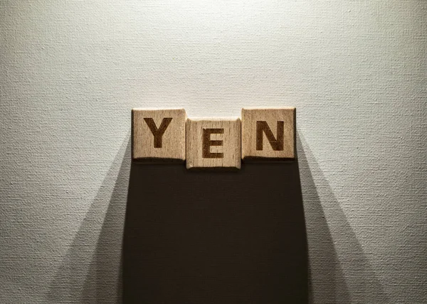 Yen Word Geschreven Houten Blokken — Stockfoto