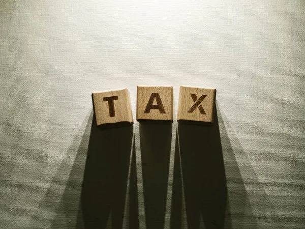 Palabra Impuestos Escrita Bloques Madera —  Fotos de Stock