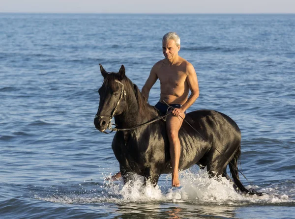 Jinete en el mar — Foto de Stock